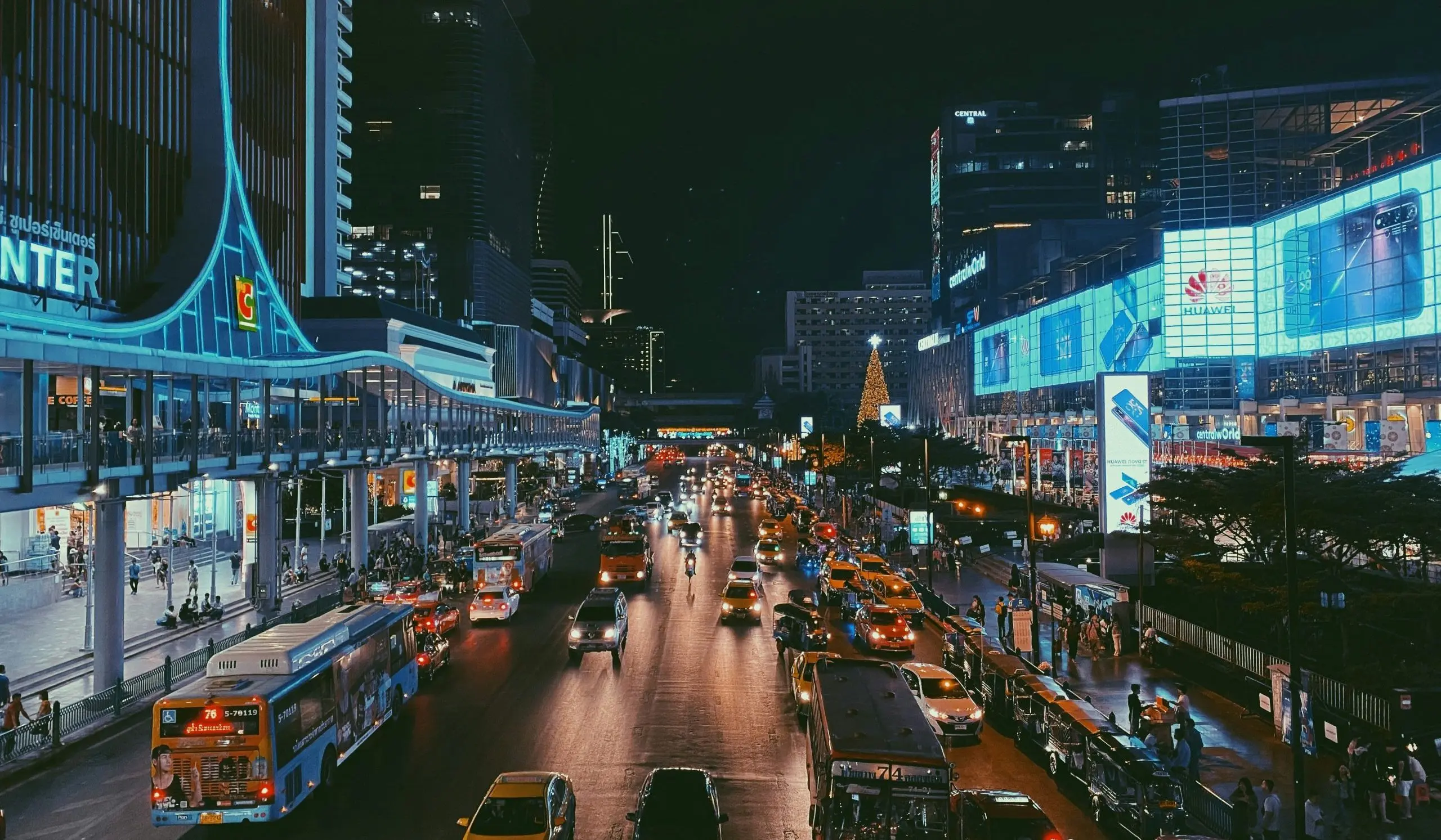 Evening traffic and city buildings in central Bangkok